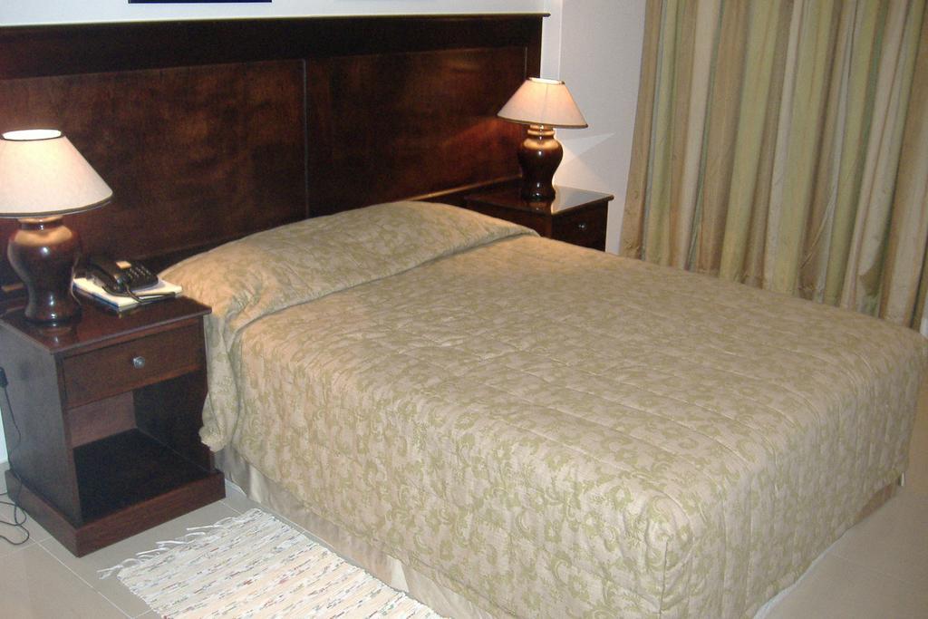 Vip Inn Beira Habitación foto